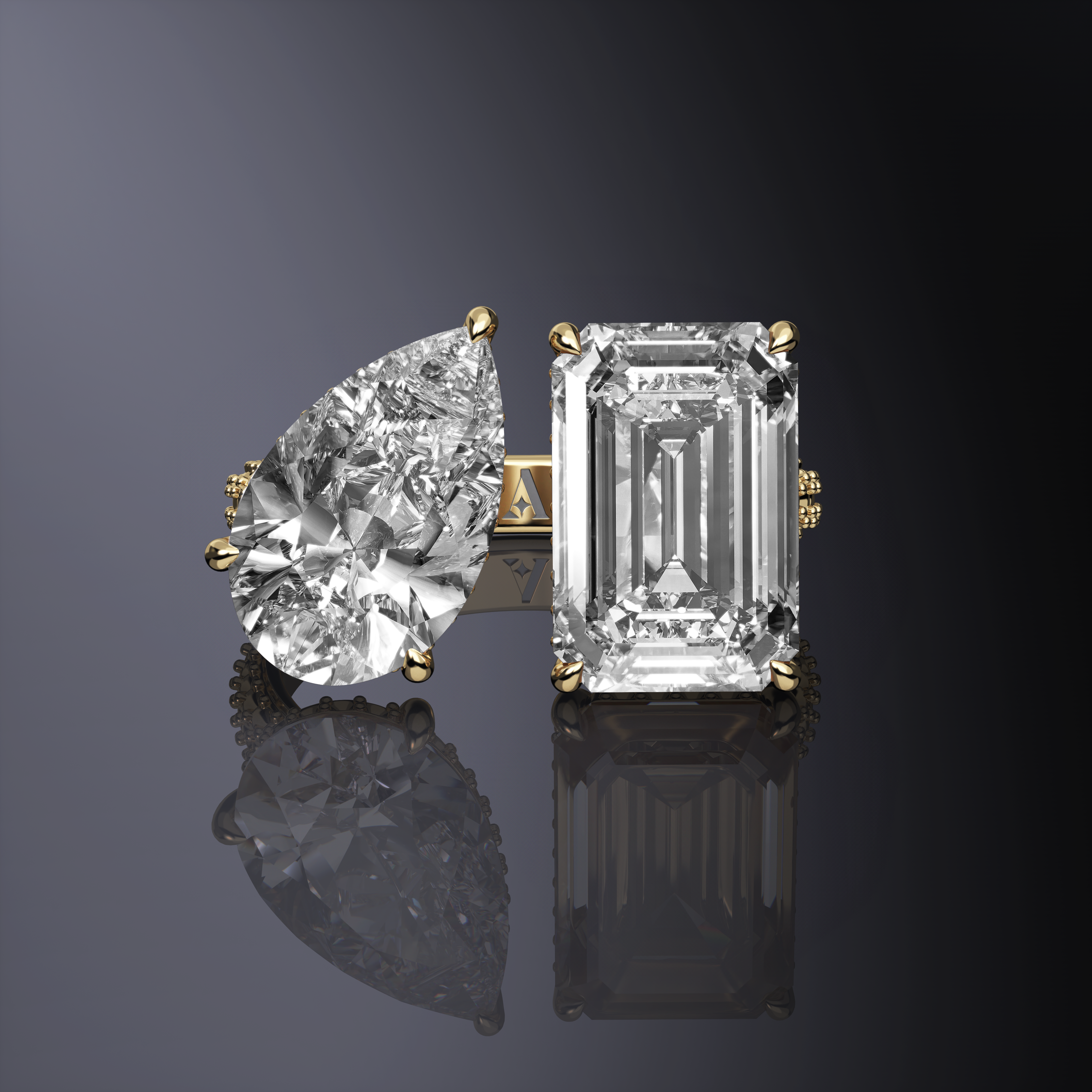 Pear and Emerald Cut Ring