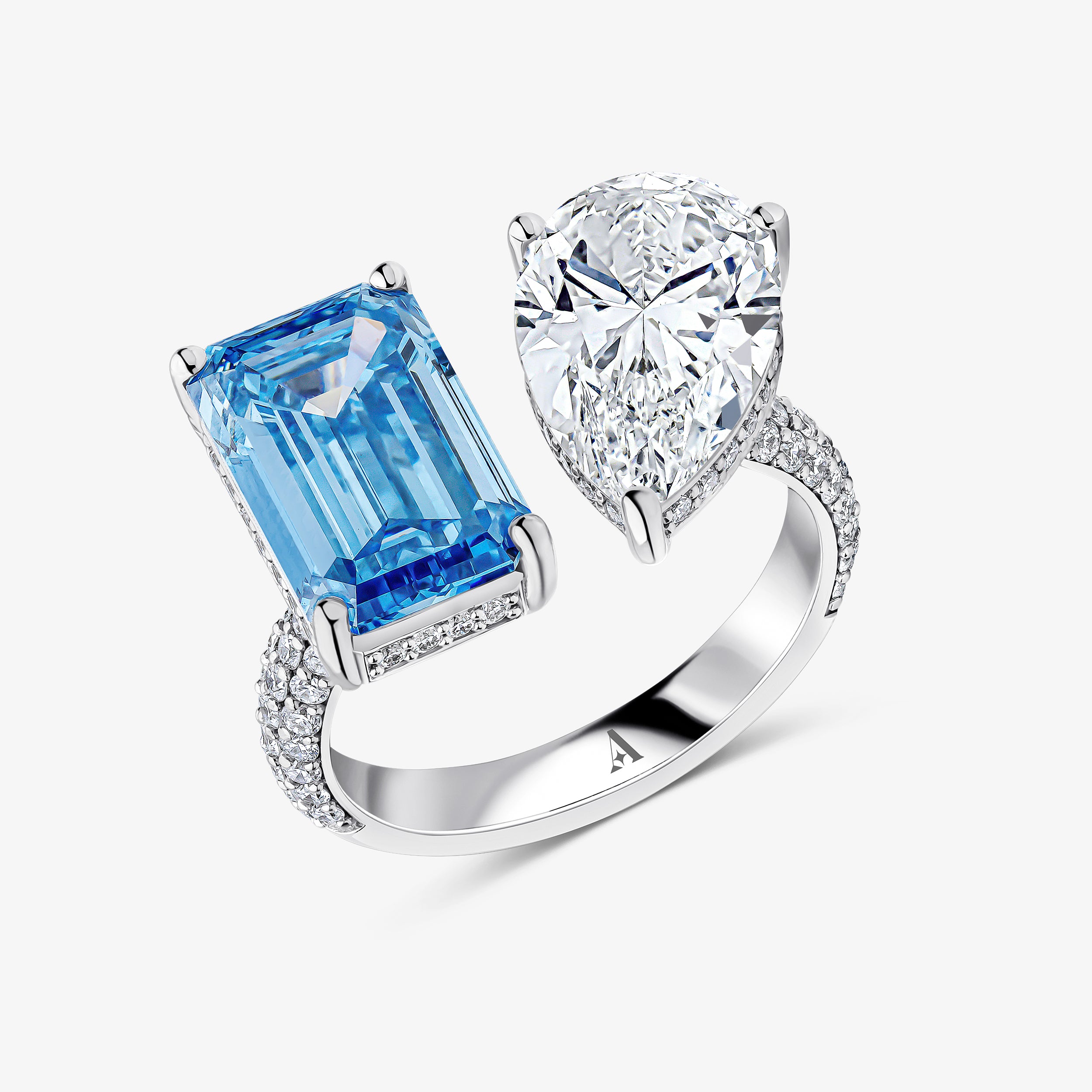 Pear and Emerald Cut Blue Diamond Ring