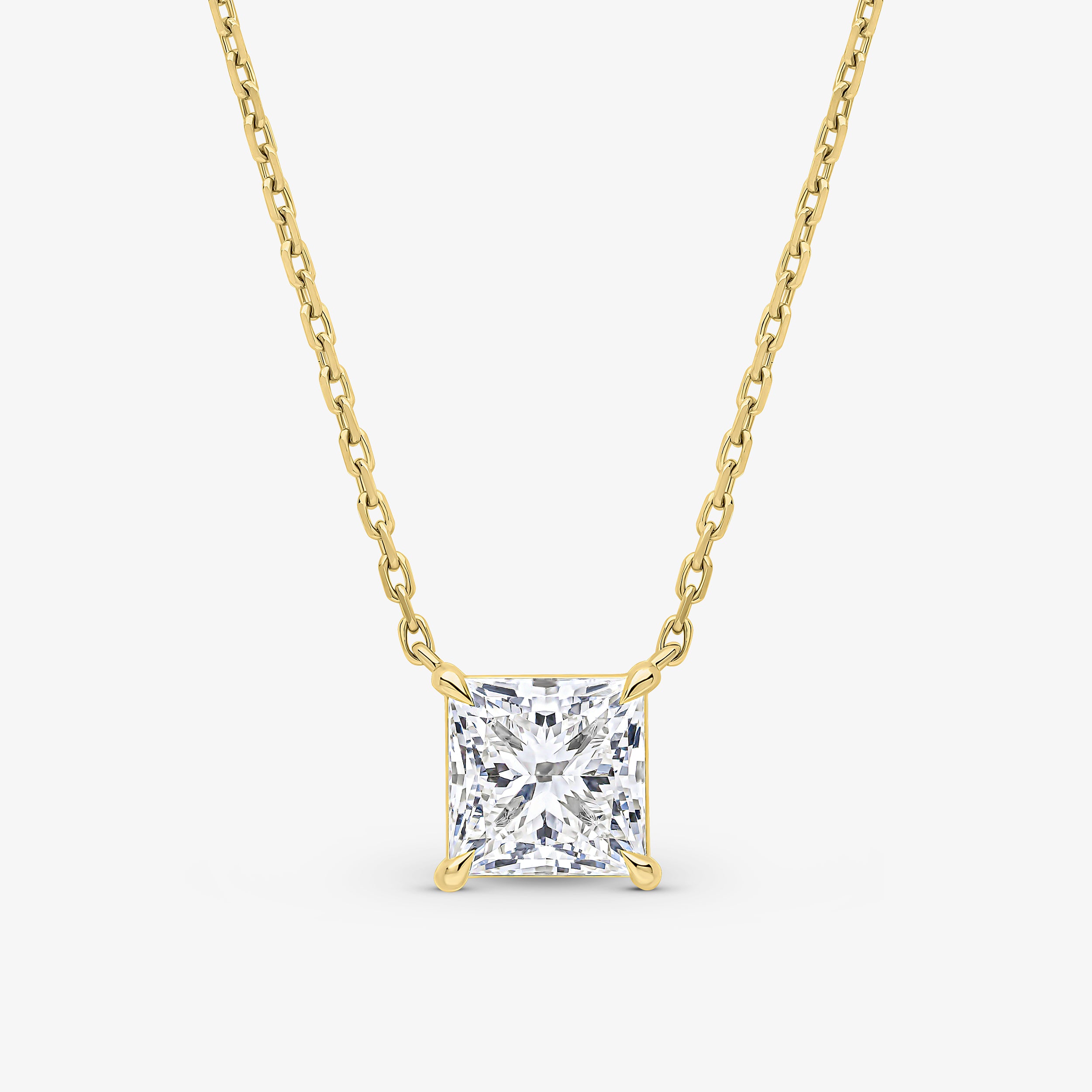 Pendentif serti griffes taille princesse