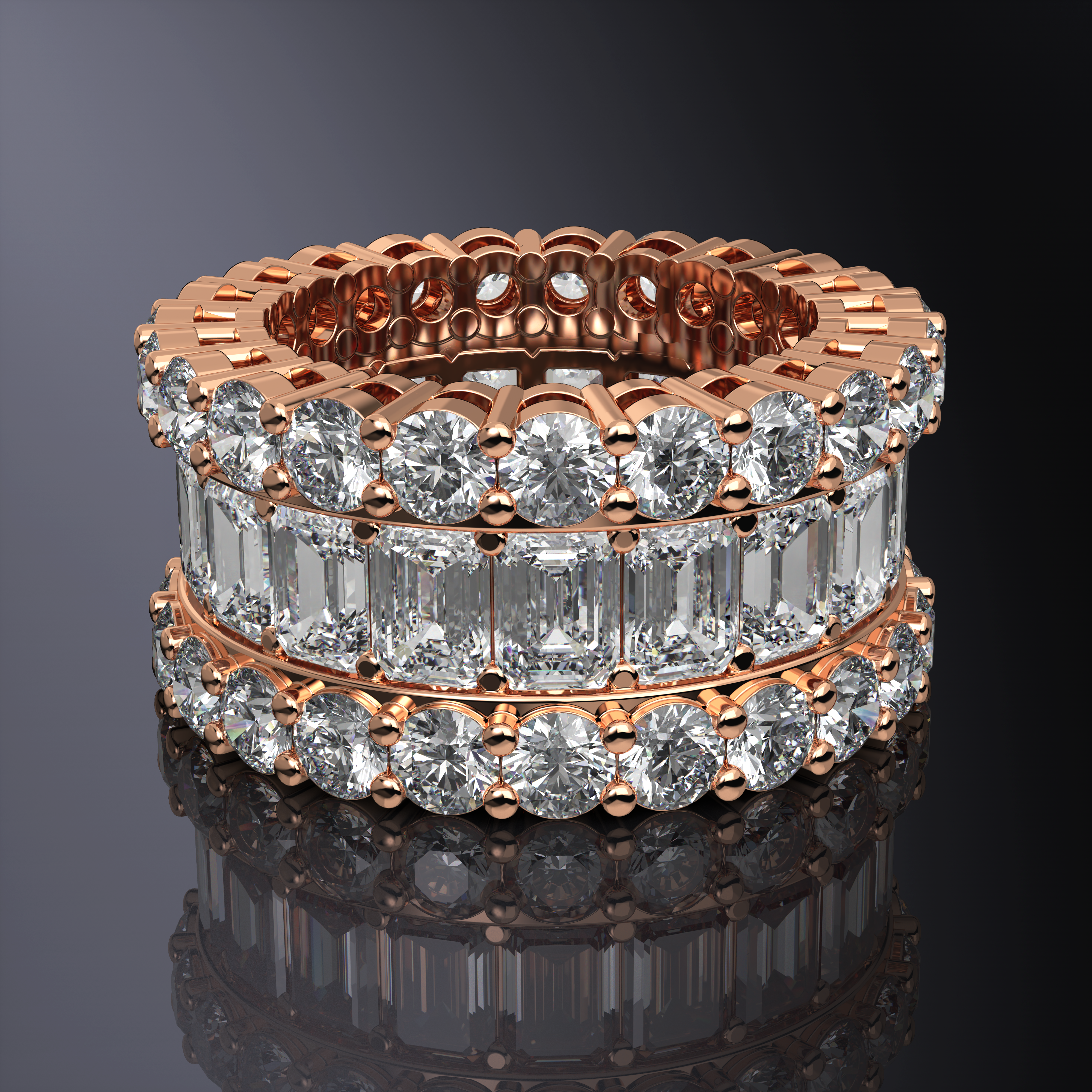 Bague éternité triple rangée émeraudes et brillants
