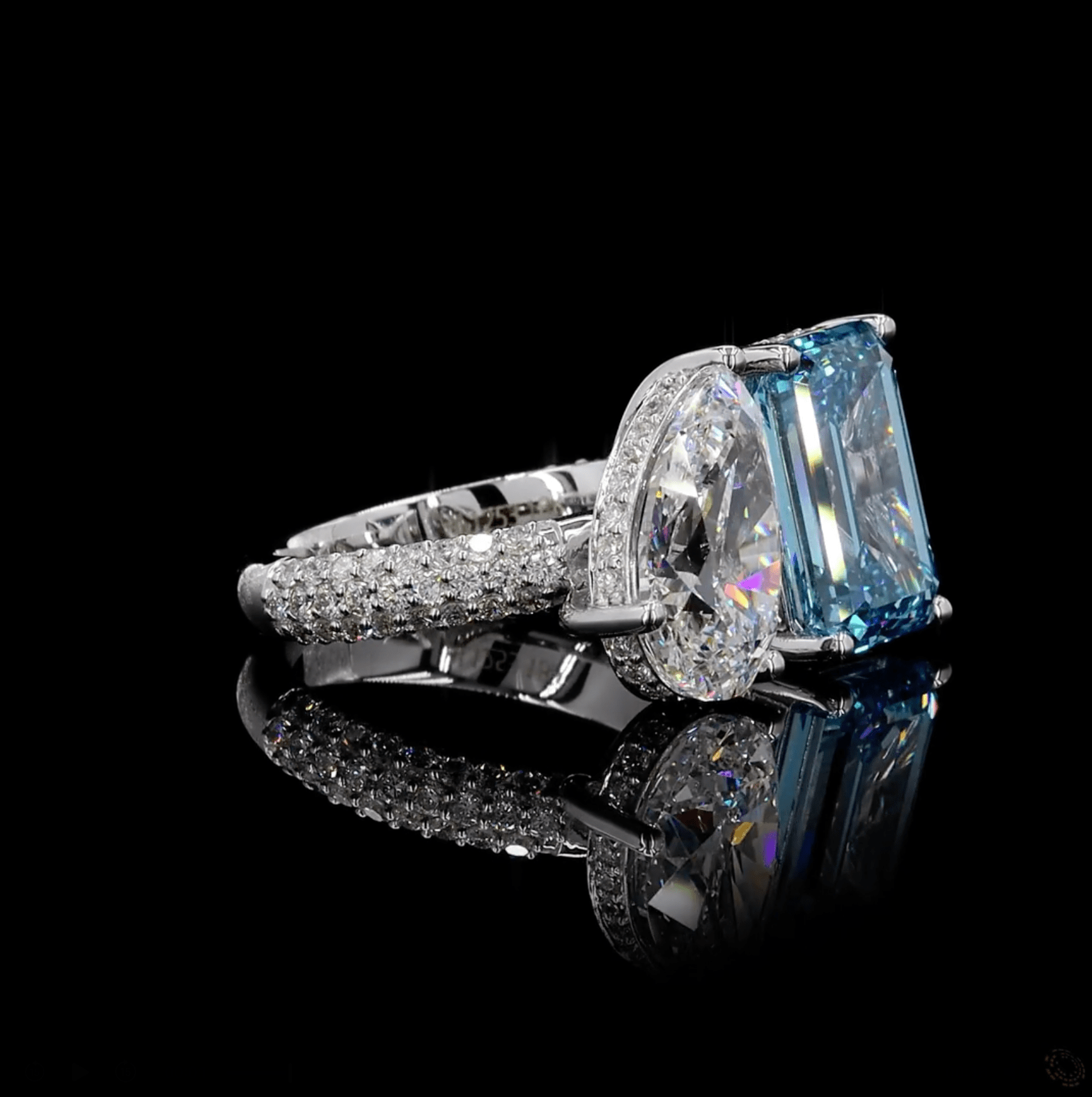 Astrea's Pear and Emerald Blue Ring