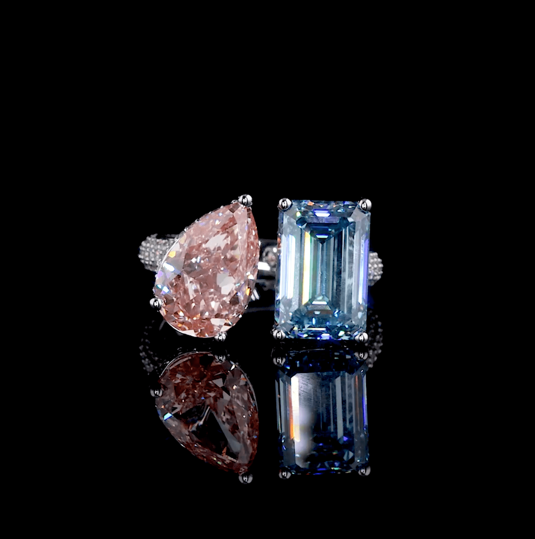 Pear and Emerald Cut Pink Diamond Ring