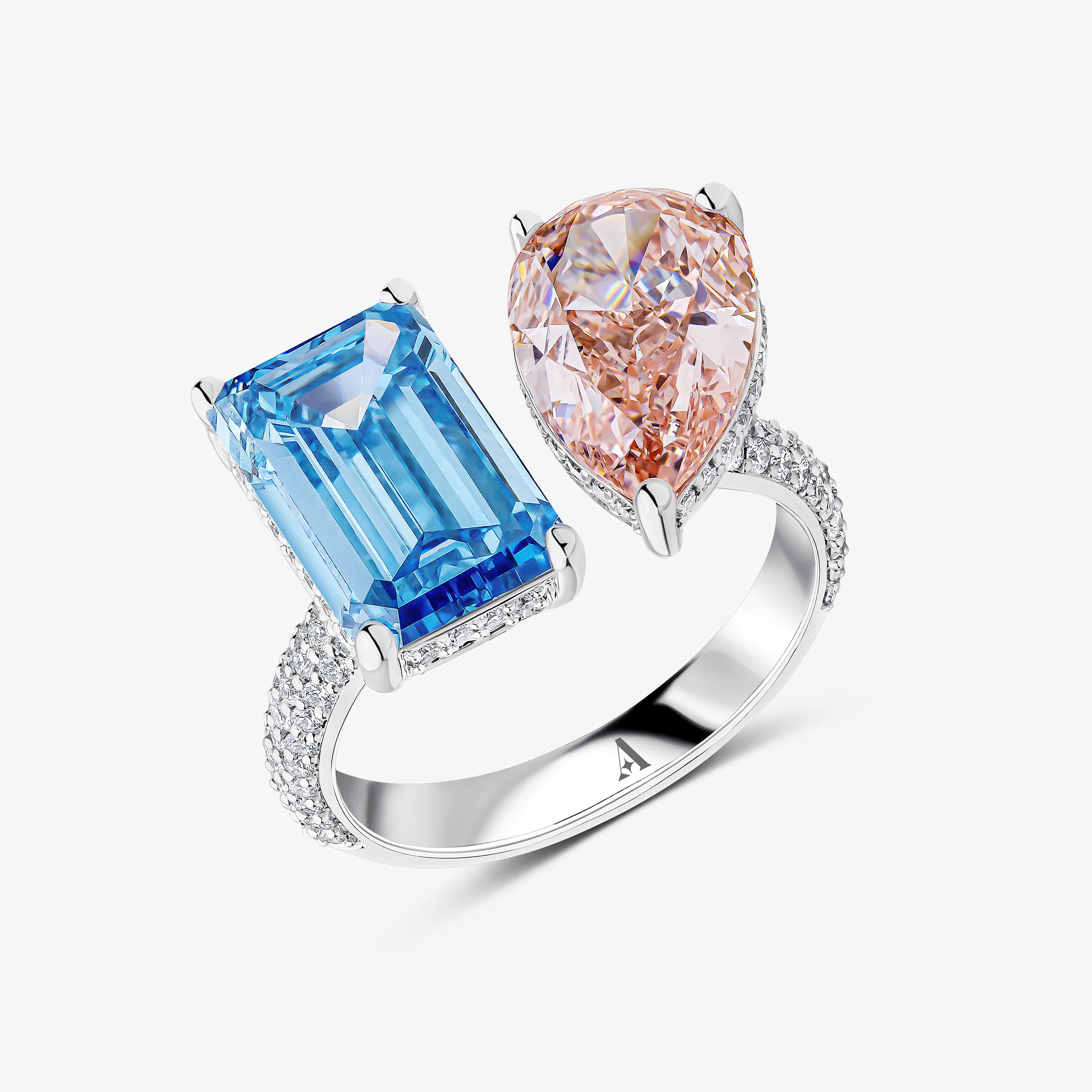 Pear and Emerald Cut Pink and Blue Diamond Ring